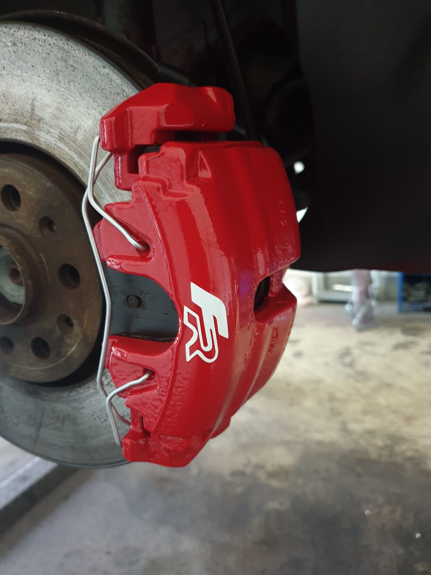 after Red brake caliper painting