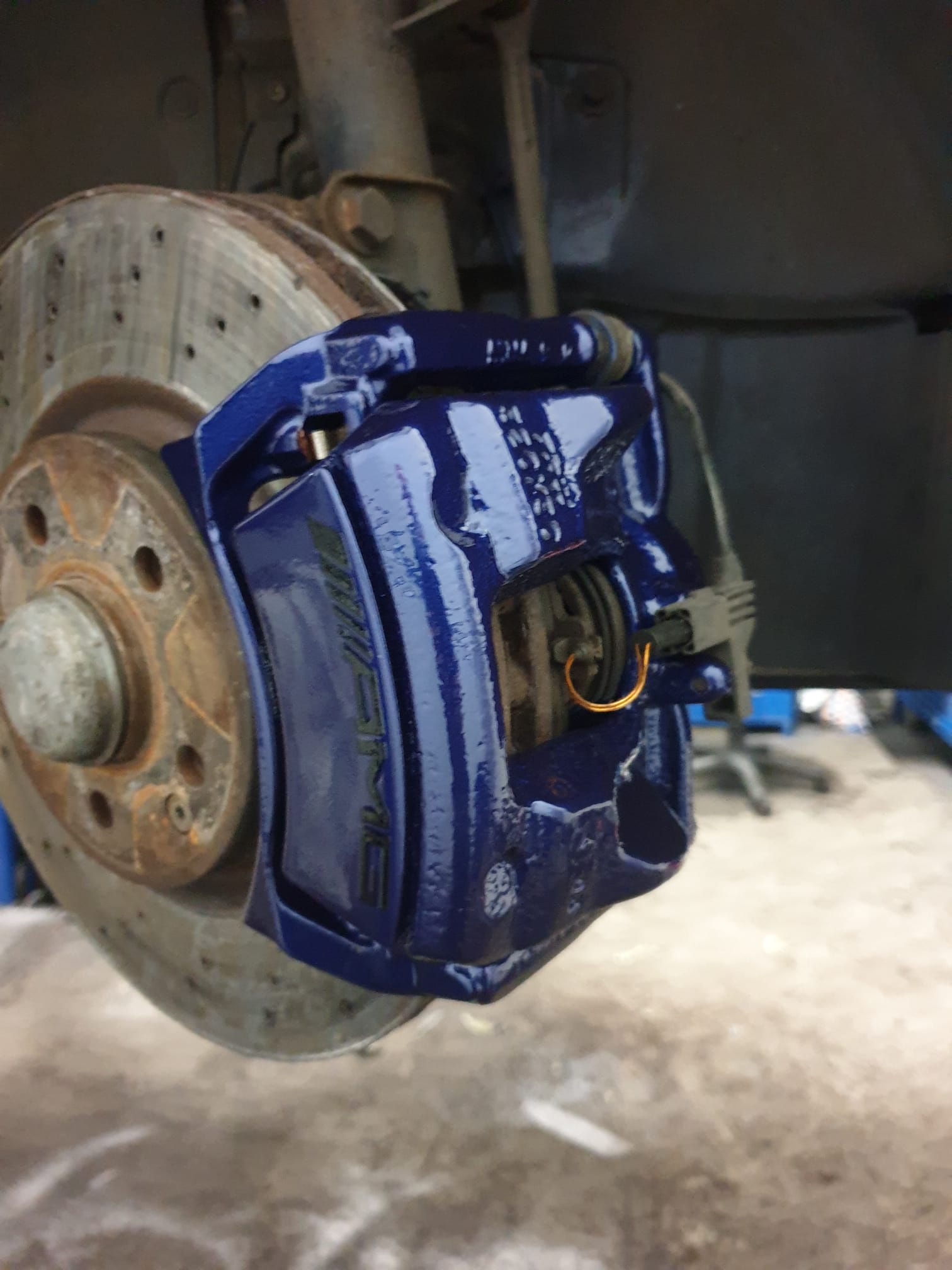 after Red brake caliper painting