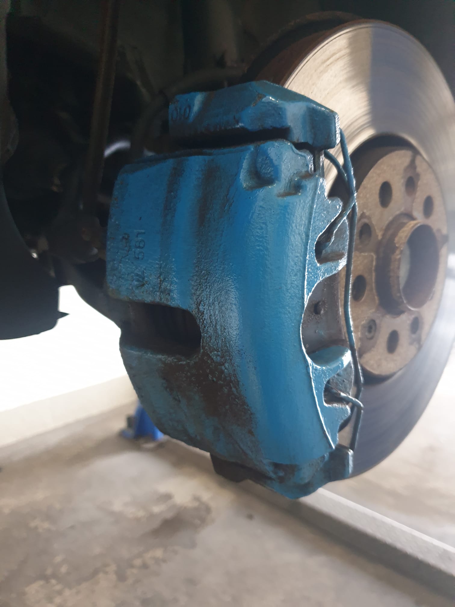 before brake caliper painting
