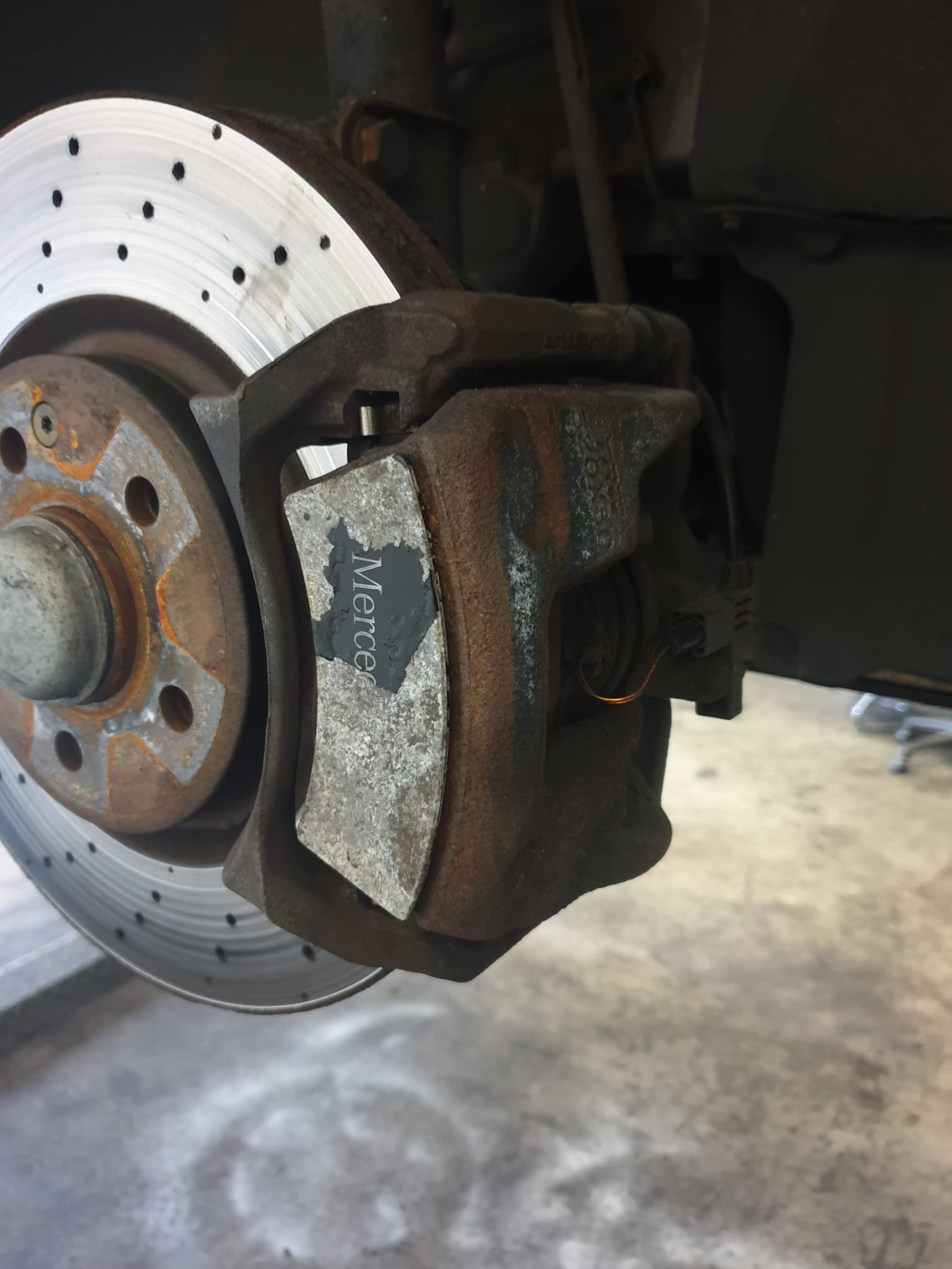 before brake caliper painting